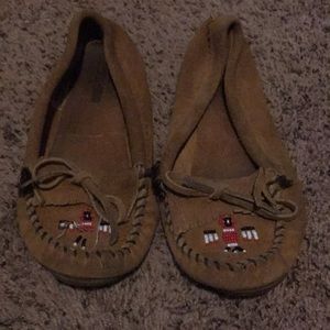 Size 7.5 Minnetonka Shoes. Worn only a few times